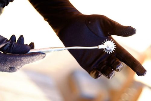 Gloves on sadistic Berlin Mistress.
